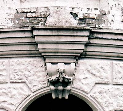 Detail in arch of plastered building