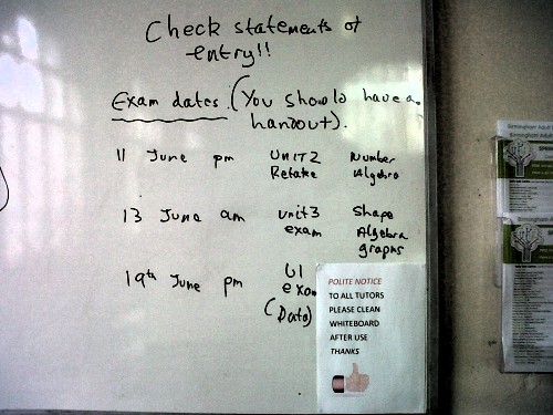 Whiteboard showing exam dates