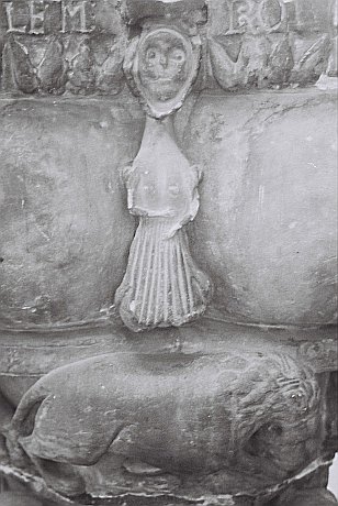 Figure on the Norman font in Staffords Collegiate church