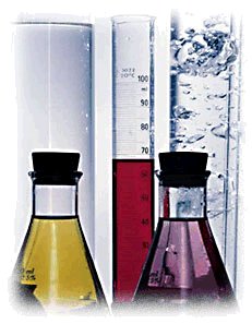 Flasks and measuring cylinders. Chemists must keep variously coloured liquids to enhance photographs