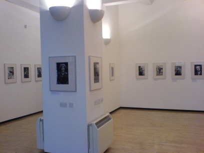 Lighthouse gallery interior showing the small prints on display